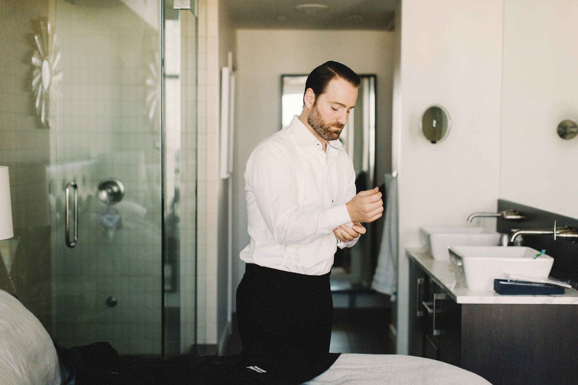 calgary wedding photographer, calgary wedding, fairmont palliser hotel, groom getting ready, armani wedding