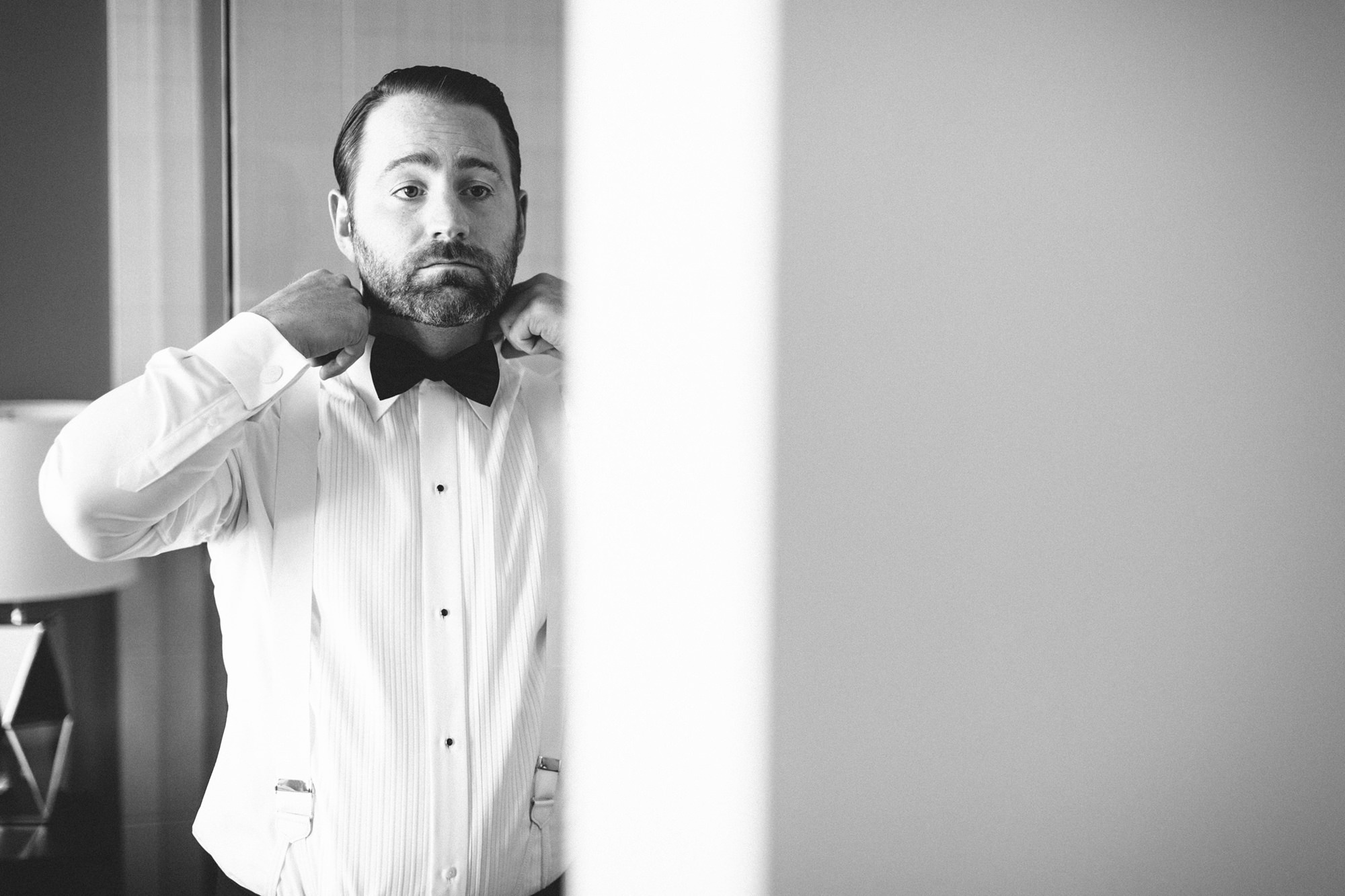 calgary wedding photographer, calgary wedding, fairmont palliser hotel, groom getting ready, armani wedding