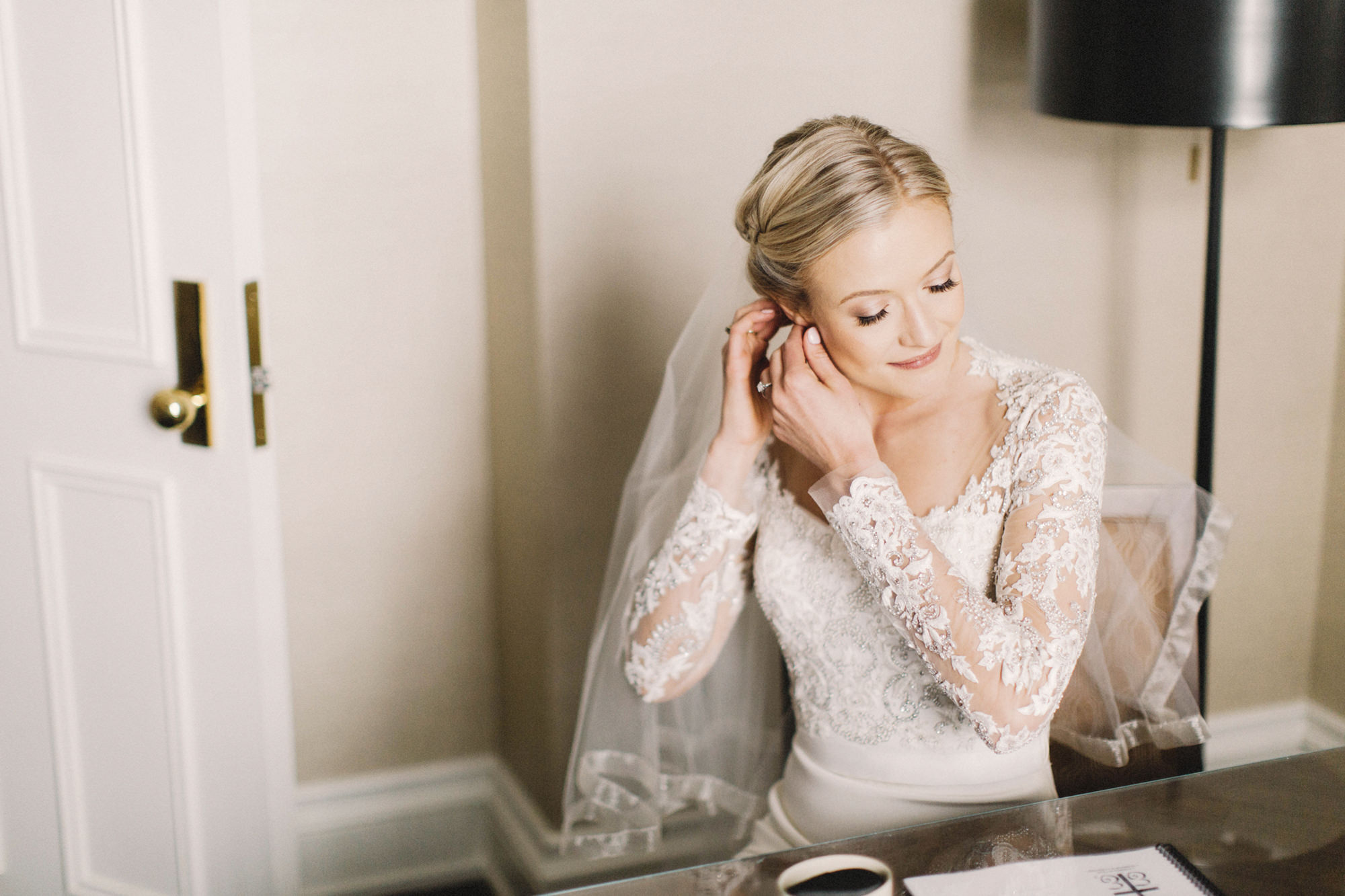 calgary wedding photographer, calgary wedding, fairmont palliser hotel, bride getting ready, reem acra dress