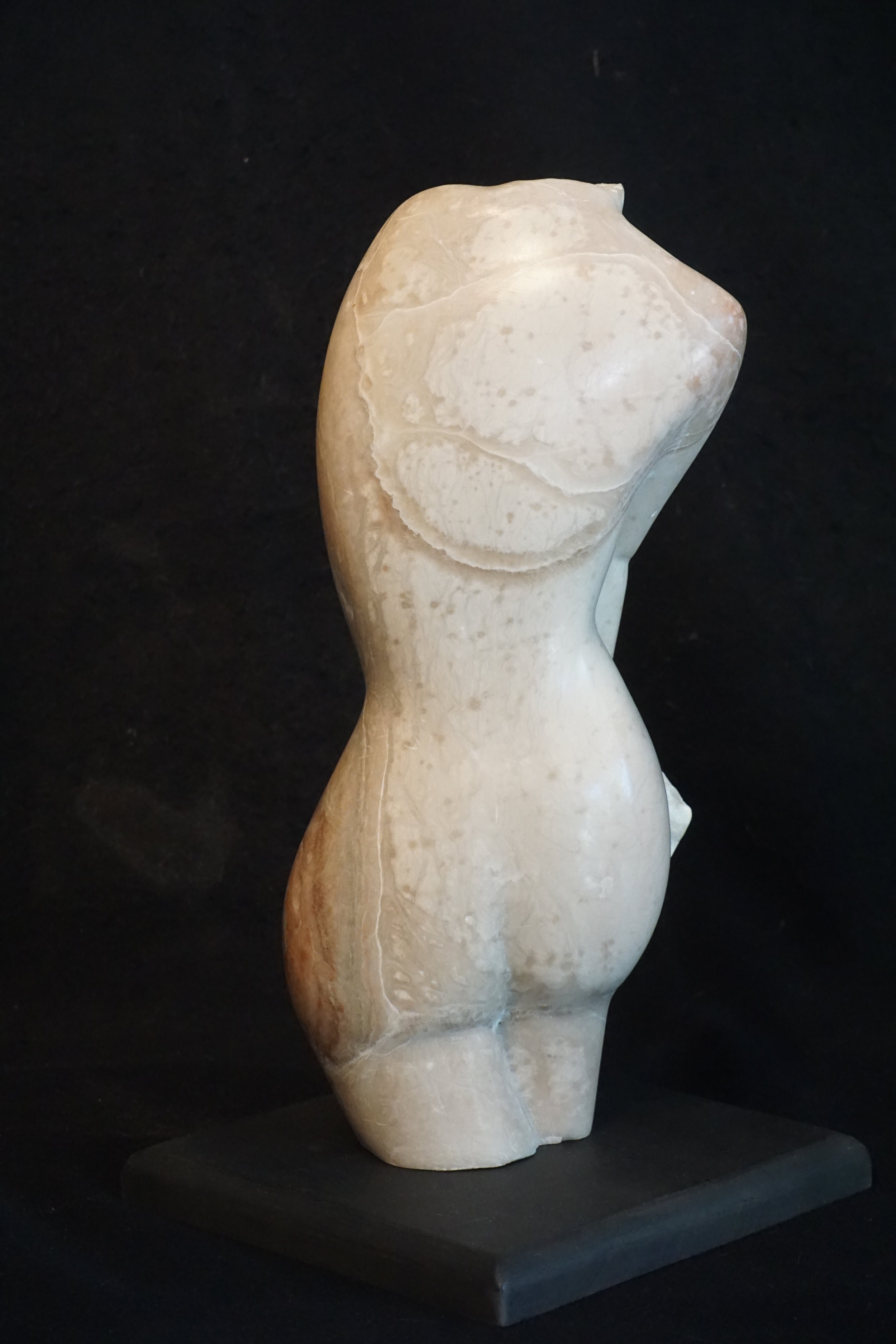 The finished piece after sanding and waxing, mounted on a ½” thick wooden base.