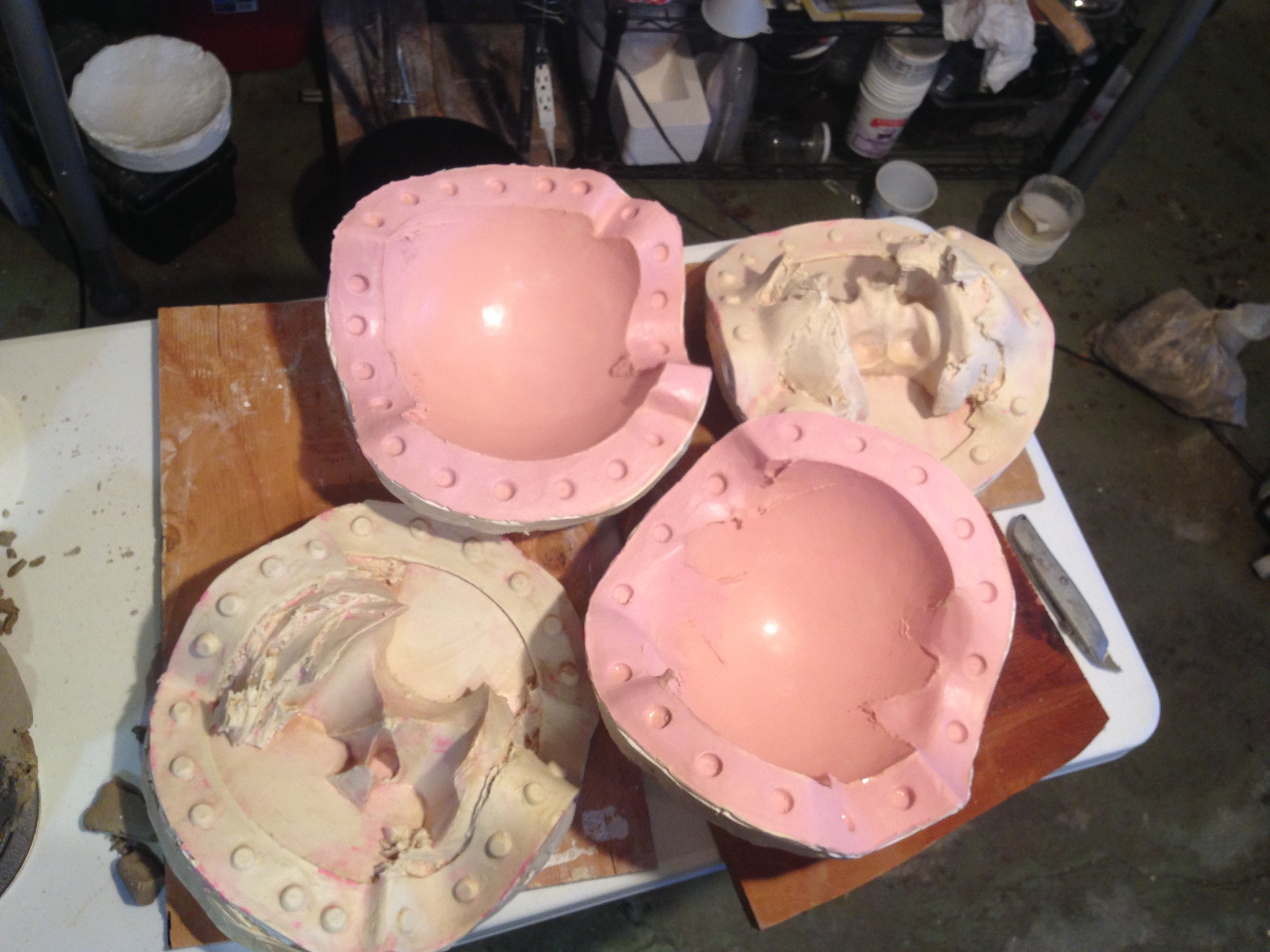 The mold is complete. Four rubber parts and four mother mold parts. The mother mold is holding the rubber mold in place, and is made of hydrocal, which is a kind of plaster.