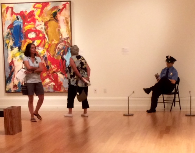Scene from Vero Beach Museum of Art with "security guard" sculpture