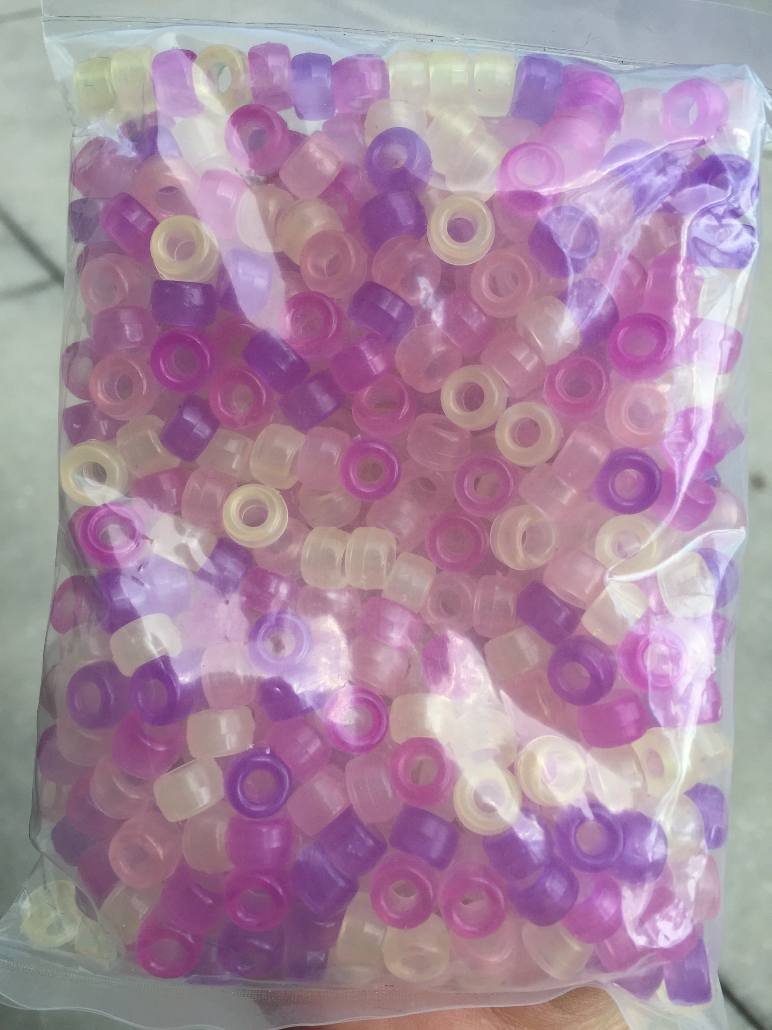 Nanoparticles in the dye change shape (and therefore color) when exposed to ultraviolet light.