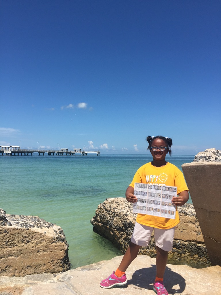 This proud sleuth had fun in the sun finding the mysteriously missing shells at beautiful Fort De Soto!