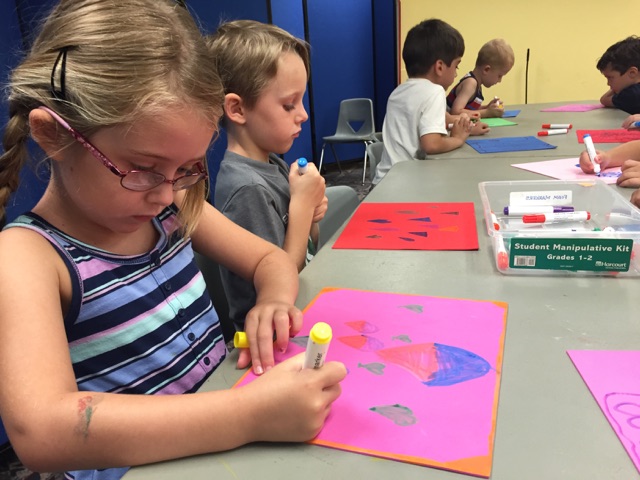 Campers expressed themselves by drawing on foam with permanent markers.