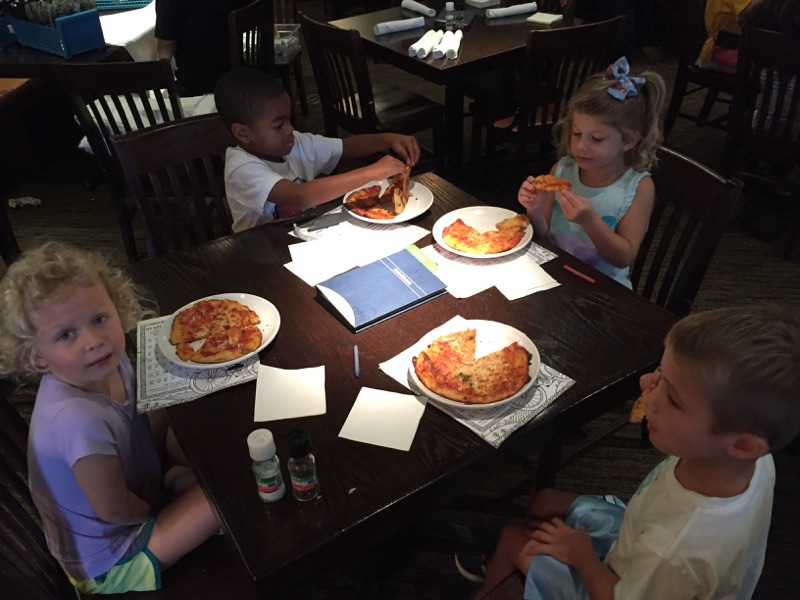 Campers enjoy the "fruits" of their labors (tomatoes are a fruit, right?).