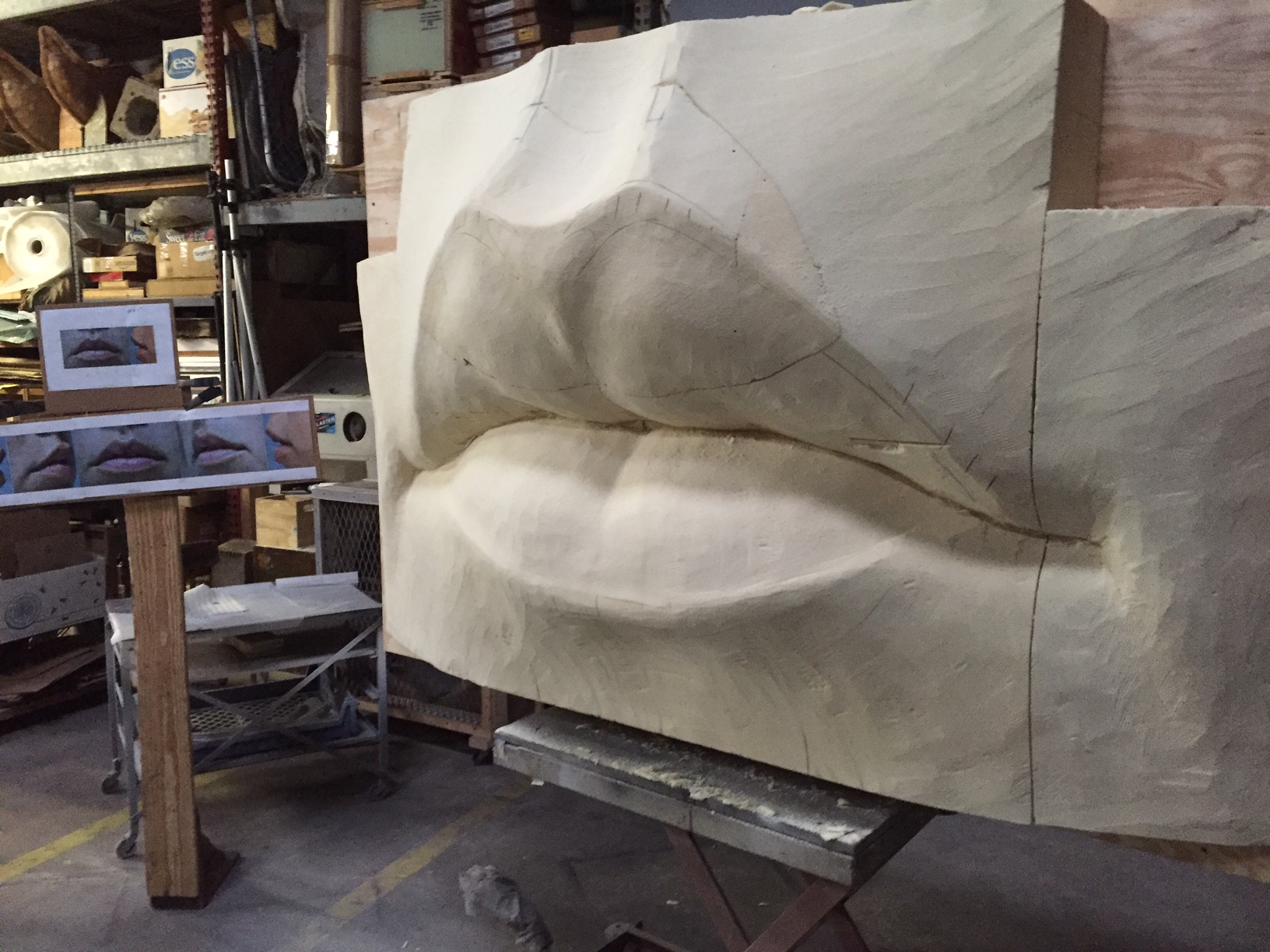 Now that the first carving session is complete the urethane material that was very blocky previously has been transformed. The intent of the piece is visible. This is my favorite stage of the process because the intent becomes apparent and is no longer abstracted by process. The energy of the carving process is visible in the roughed out form and I’m often tempted to leave the idea in this state but I have other plans for this piece and need a more finished surface. 