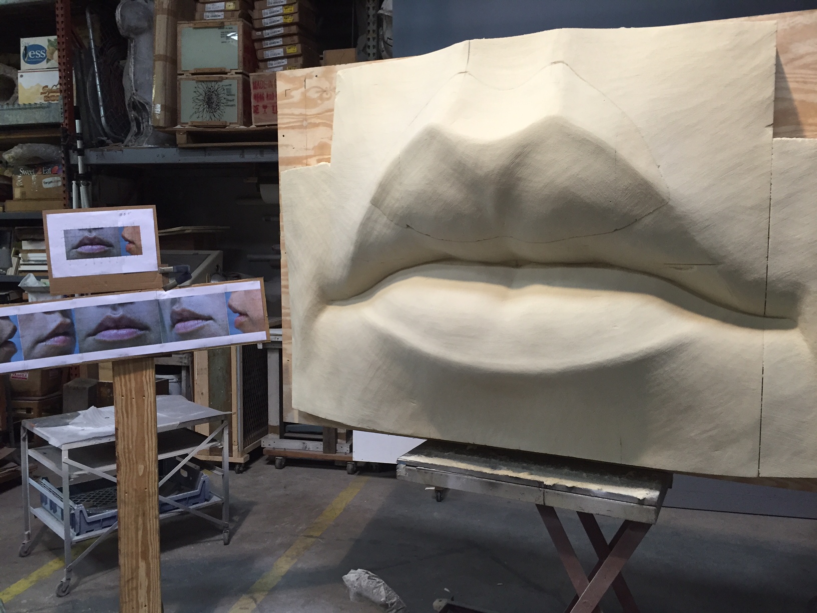 Now the carving process slows and I focus on the subtle nuances of light and shadow as they fall on the form. I need to catch the piece out of the corner of my eye as I walk in the studio and do little bits of adjusting. A little more curve here, a softer line there and walk away.
