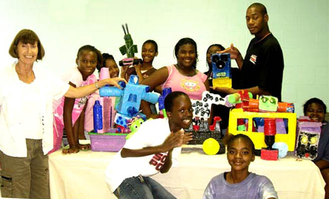 For several summers I worked with a few of my Ringling College students making collaborative installations with youth at recreation centers throughout Pinellas County through Youth Arts Corps. Here the teens and their counselor at Childs Park Recreation Center show off a train made with recycled materials and papier maché. At the end of the summer, after a morning spent "Scrubbin' the Burg" (clearing litter from St Petersburg's streets), the teens came with their completed installations to St Petersburg's Coliseum where the creations, ranging from rocket ships to circus scenes, were judged by members of the City Council. 