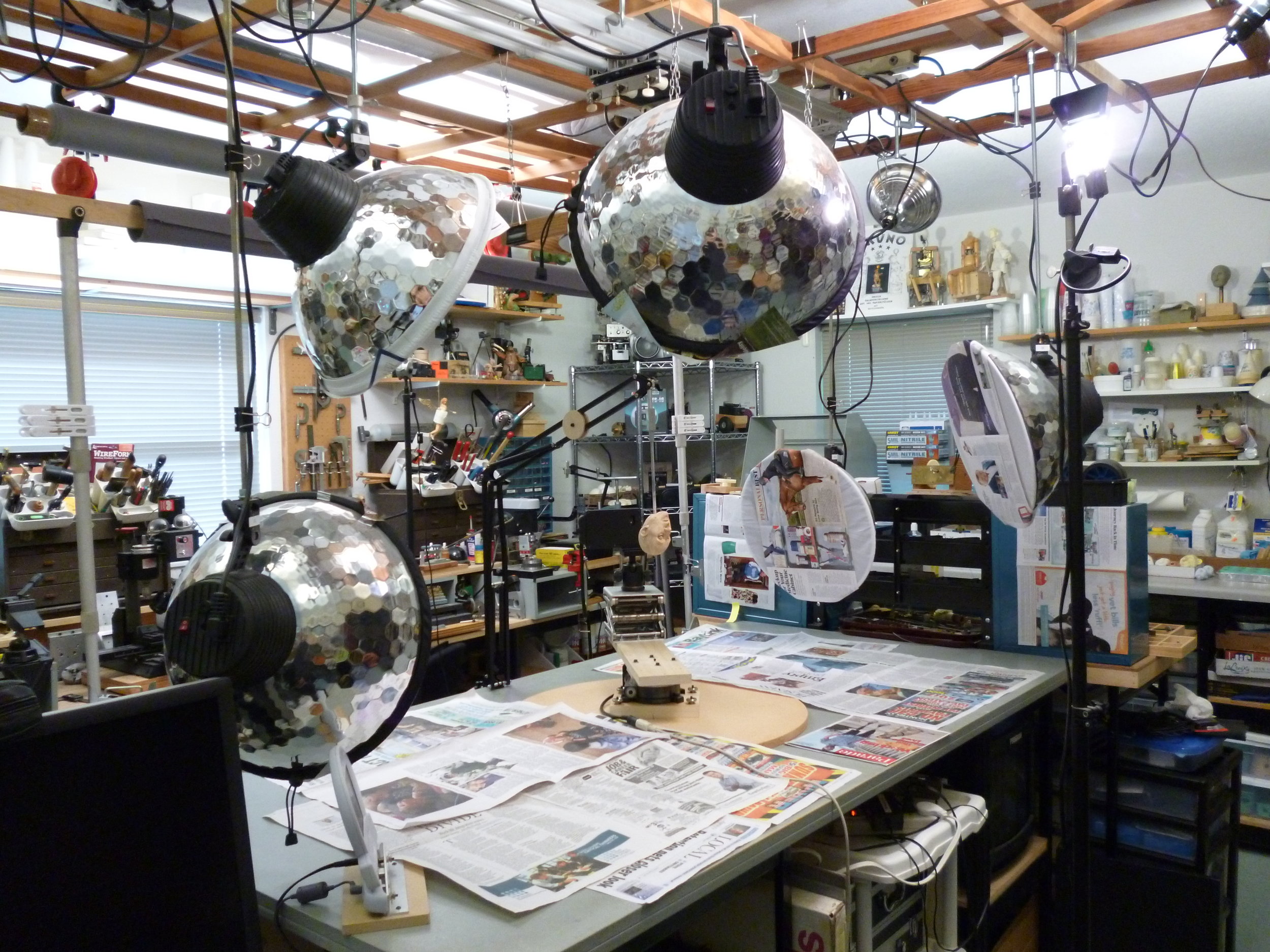 Large, blank surfaces were covered with newspaper and magazine pages. It is important not to have glossy, reflecting or repeating patterns, and no movement or changes to the scene.