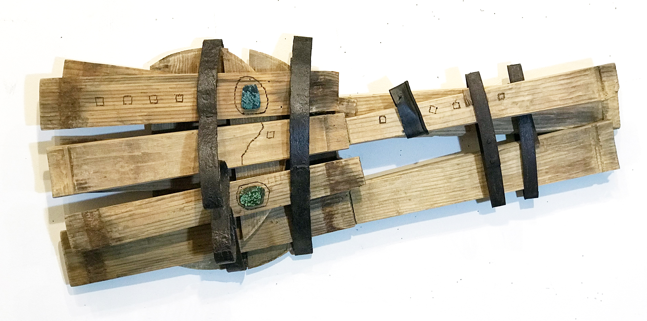 Squidish. Sculpture using found wood and metal with turquoise beads and wood burning. 30"x12"x6"D 2018.