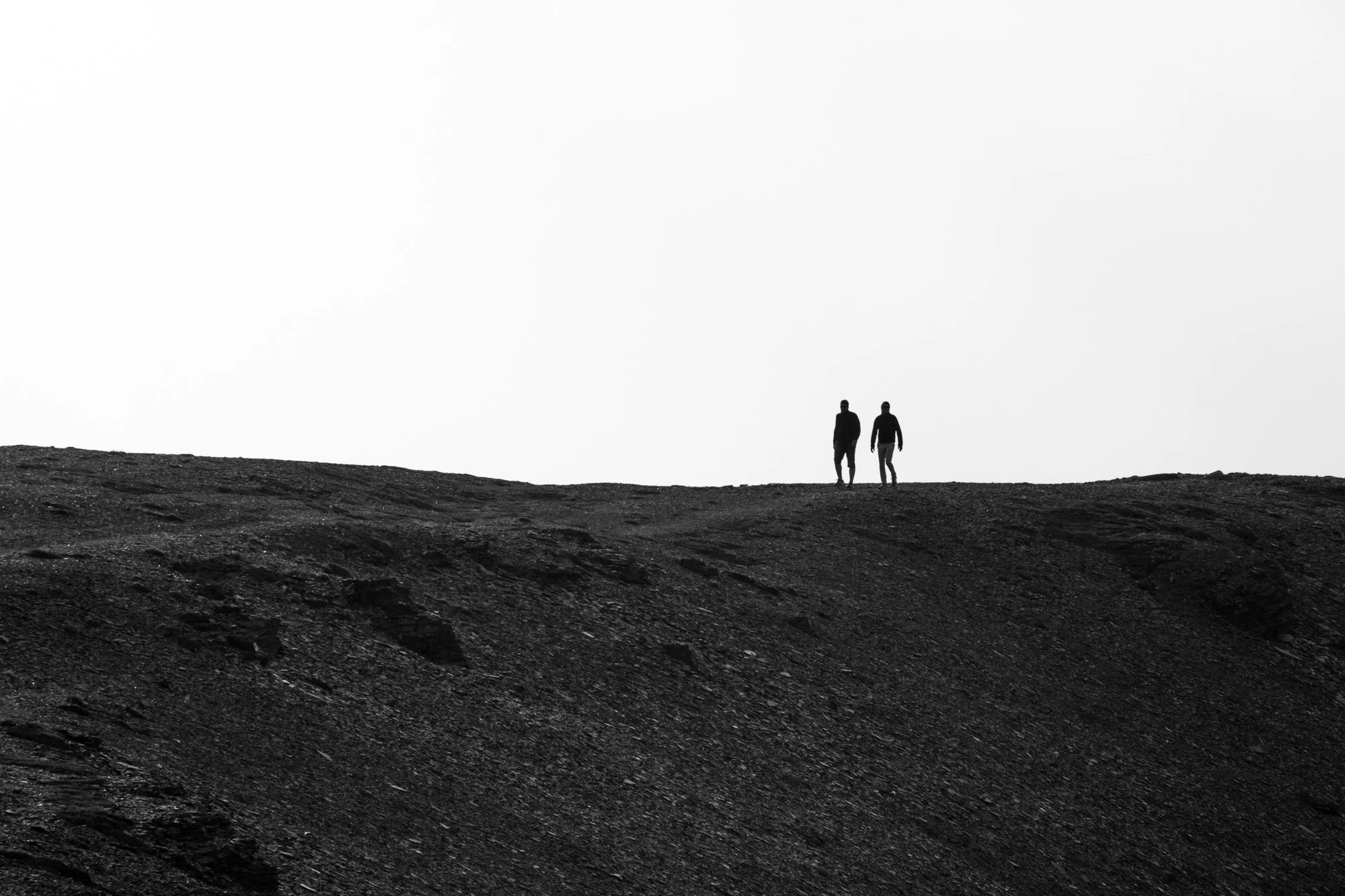 Two hikers on the Summit of Whistlers Peak in Jasper National Park.