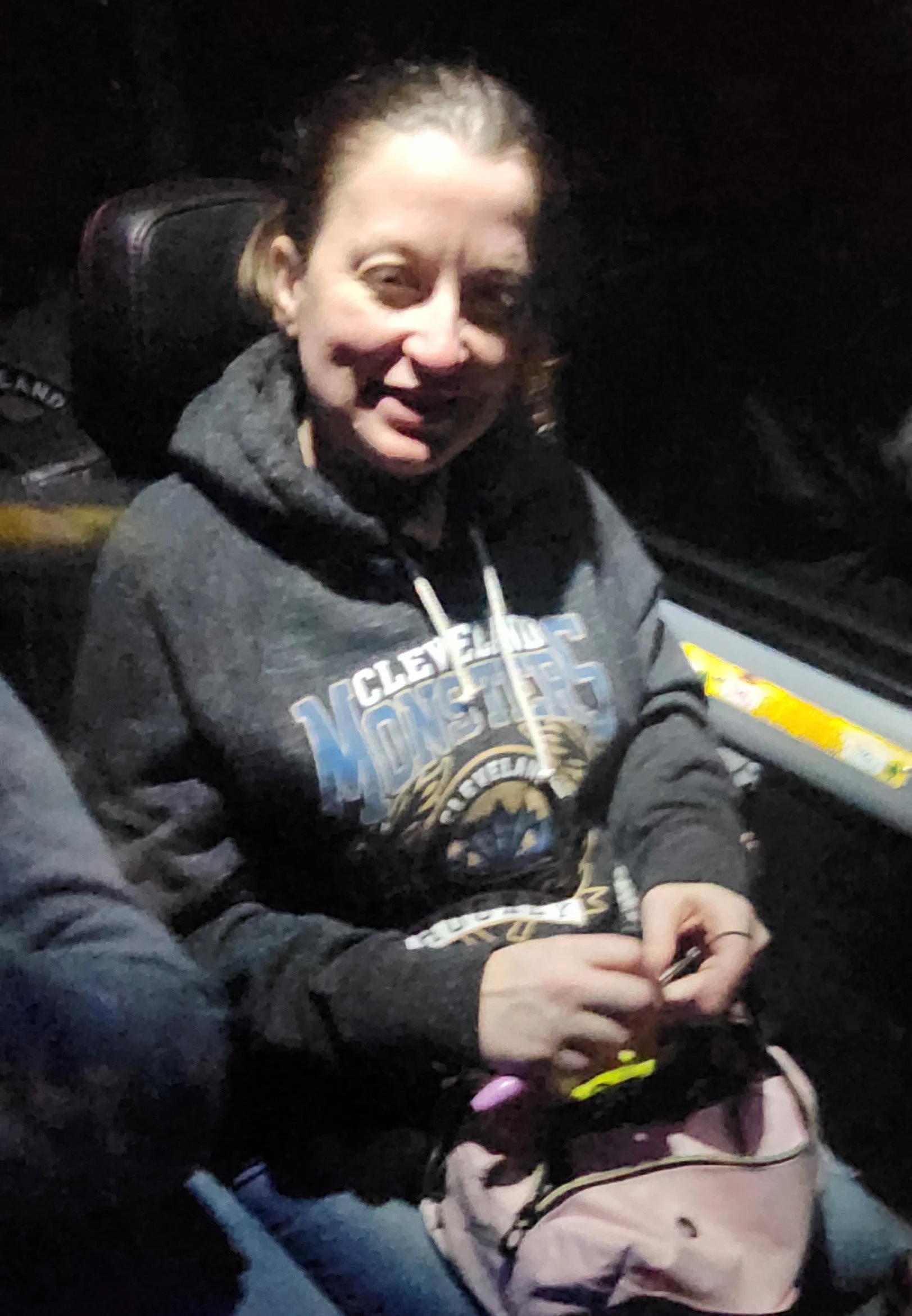 2 minutes for hooking - Stacia pictured here took over for our member Vickie who designed and made our Monster crochet hats. Stacia has added fun head wraps to the arsenal of crocheted Monsters goodies as well as continued with our koozies too. This 