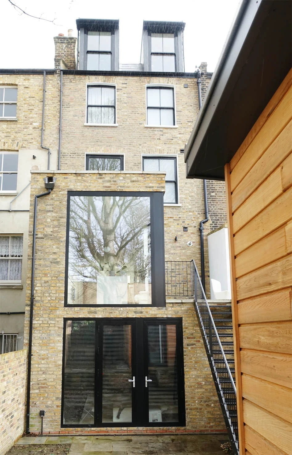 The impressive picture window at the rear with direct access to the garden.