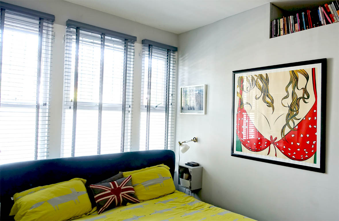 Cheeky artwork and Scion 'Mr Fox' bedding add a sense of fun in the master bedroom.