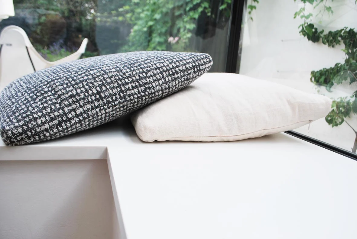 I love how Helen has carefully chosen the few items on display - right down to the cushions on the window seat.