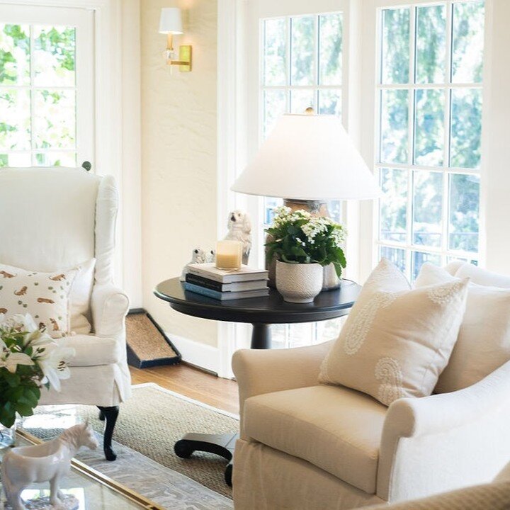 I love this cozy living room, which we completed in 2022. It has all the ingredients for the perfect mix of old and new. Slip-covered chairs, along with light and dark colors, work together in such a pretty way.