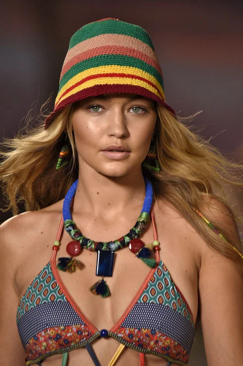 Beachy waves, a boho braid and a bronzed complexion equals summer at Tommy Hilfiger.