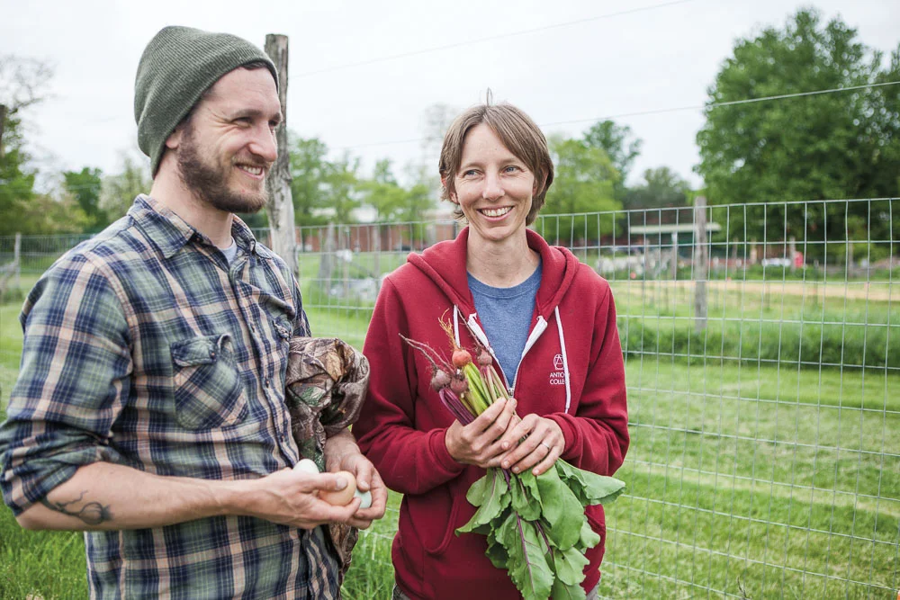 Isaac Delamatre, Antioch’s first chef and now its food service coordinatorwith Kat Christian, the farm manager