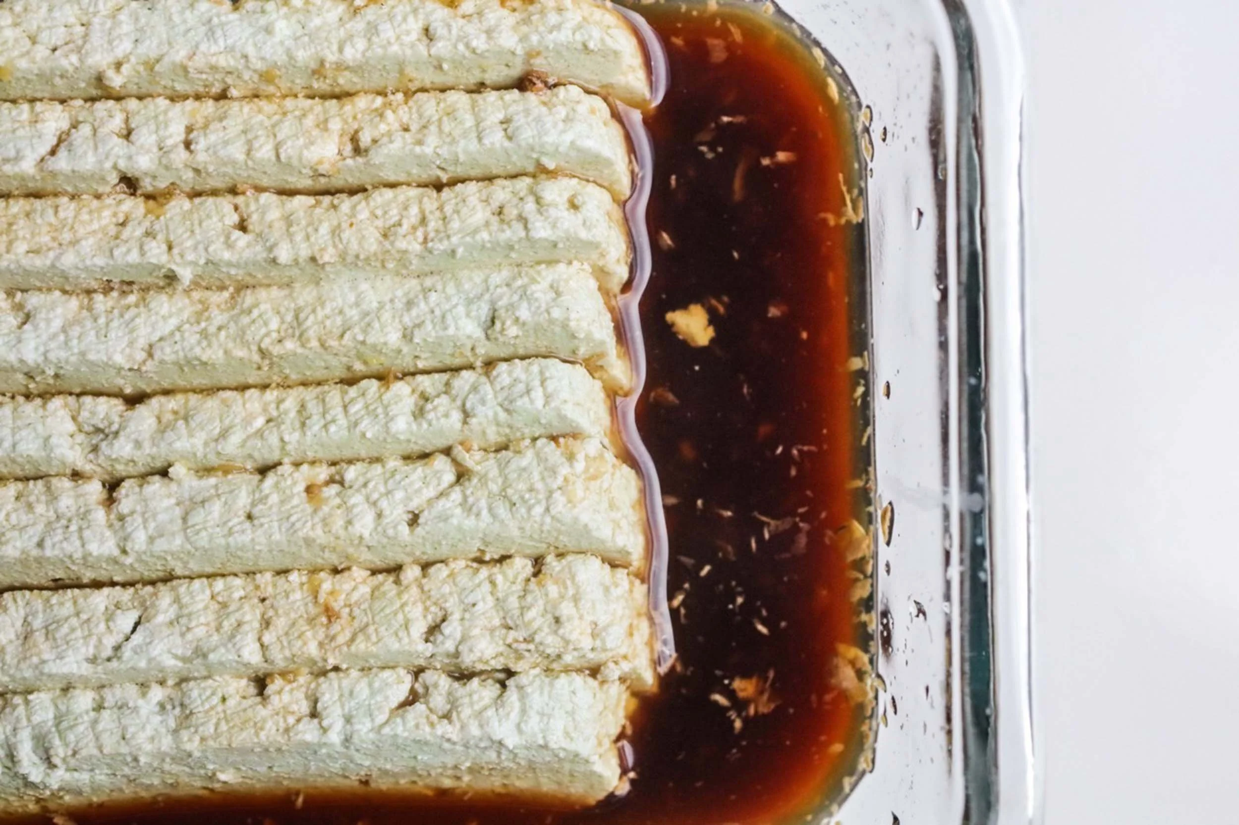 Sliced and marinated pumpkin seed tofu