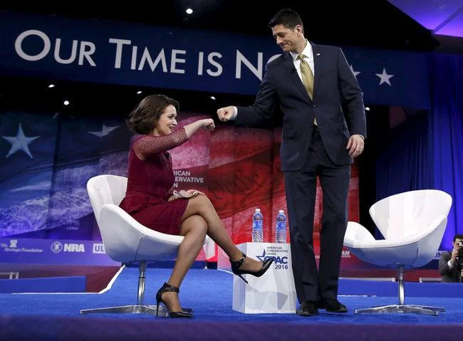Carrie fist-bumping with Paul Ryan at the 2016 CPAC