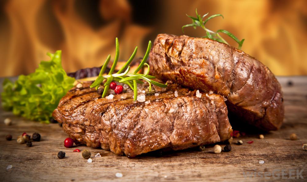 two-slices-of-beef-steak-near-fireplace.jpg