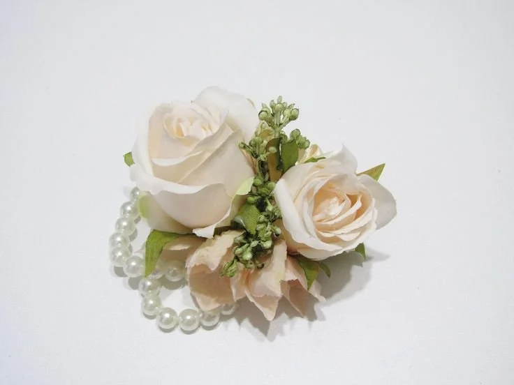 pearl wristlet corsage.jpeg