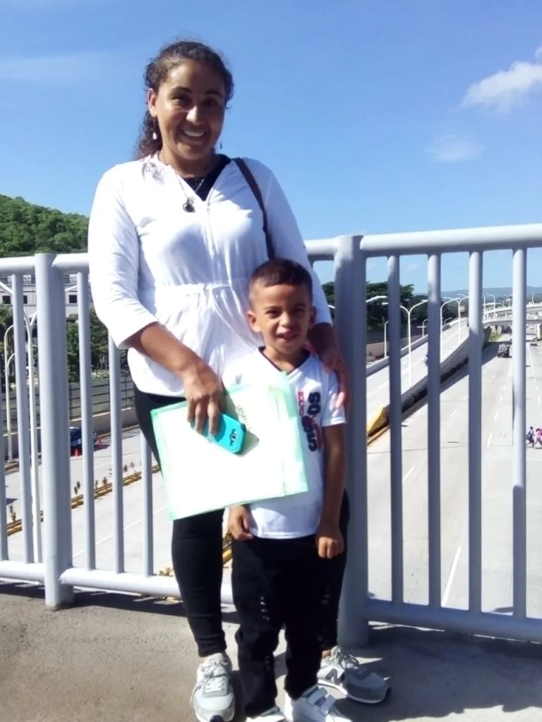 Joshua and his mom in Managua after receiving their visas