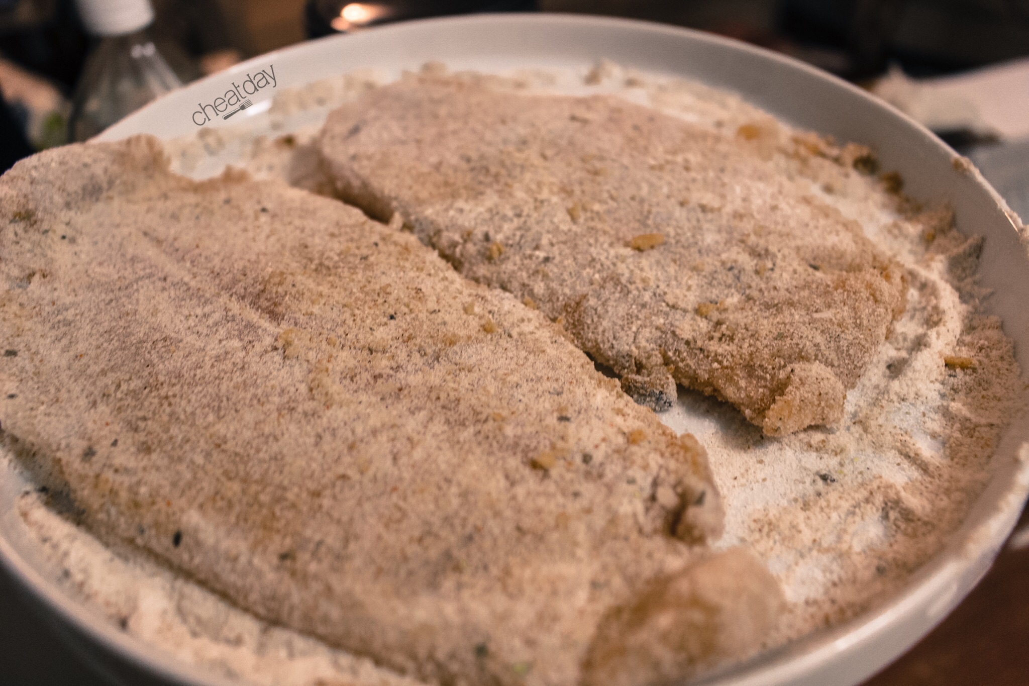 Seasoned Filets - Flour pressed into them and the excess flour shaken off (on the sides of the plate)