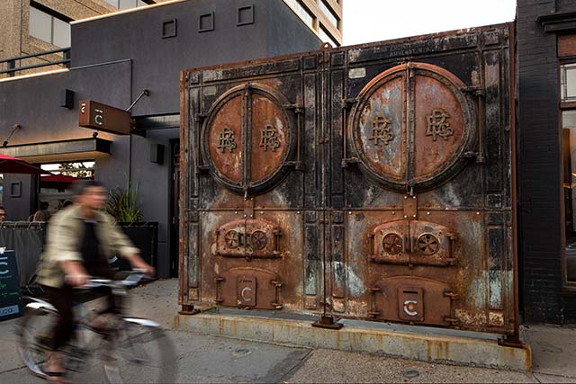  Side alley patio doors made from 120 year old boiler doors. 