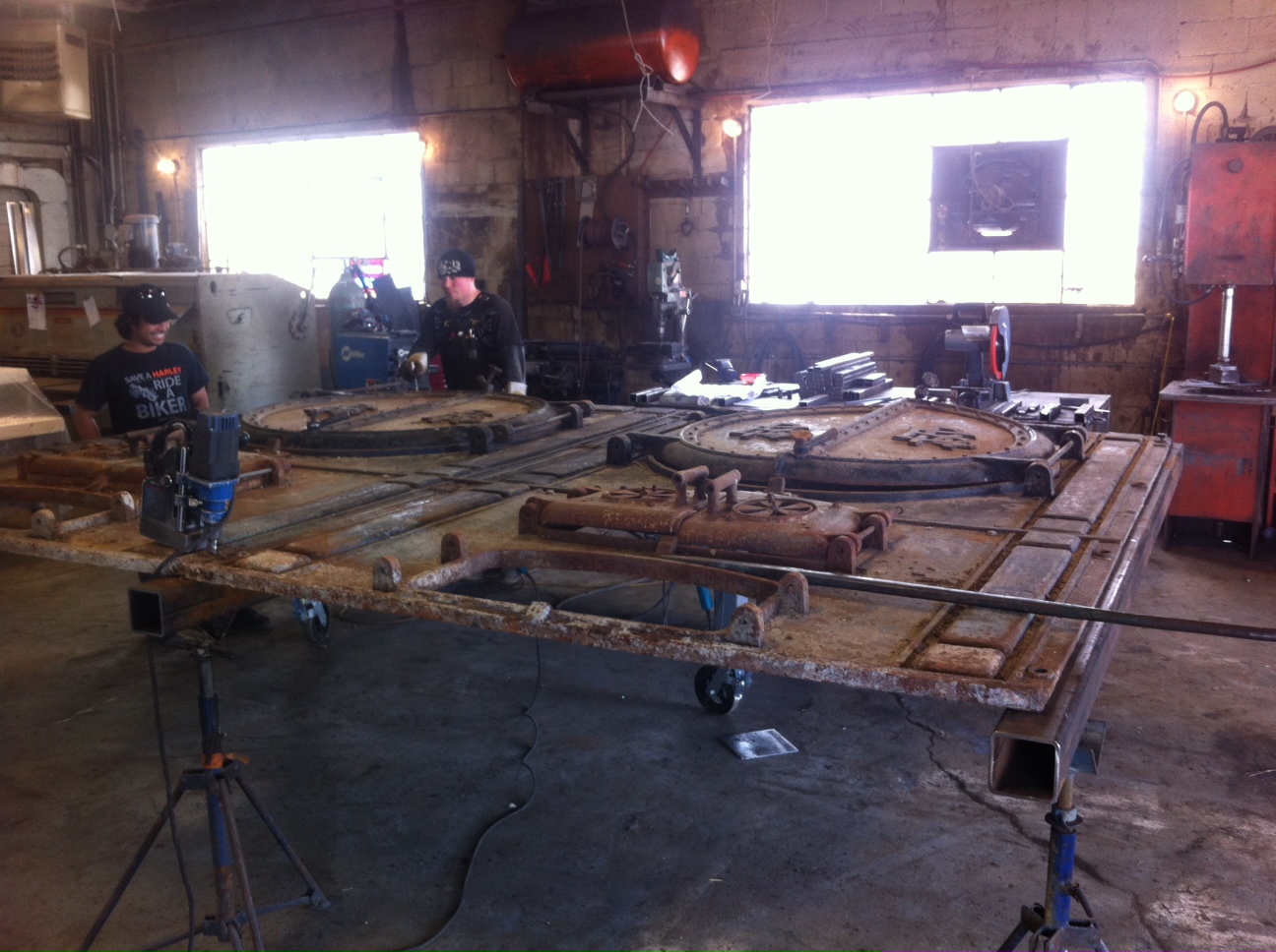  Fabrication of patio doors from cast iron boiler doors. 