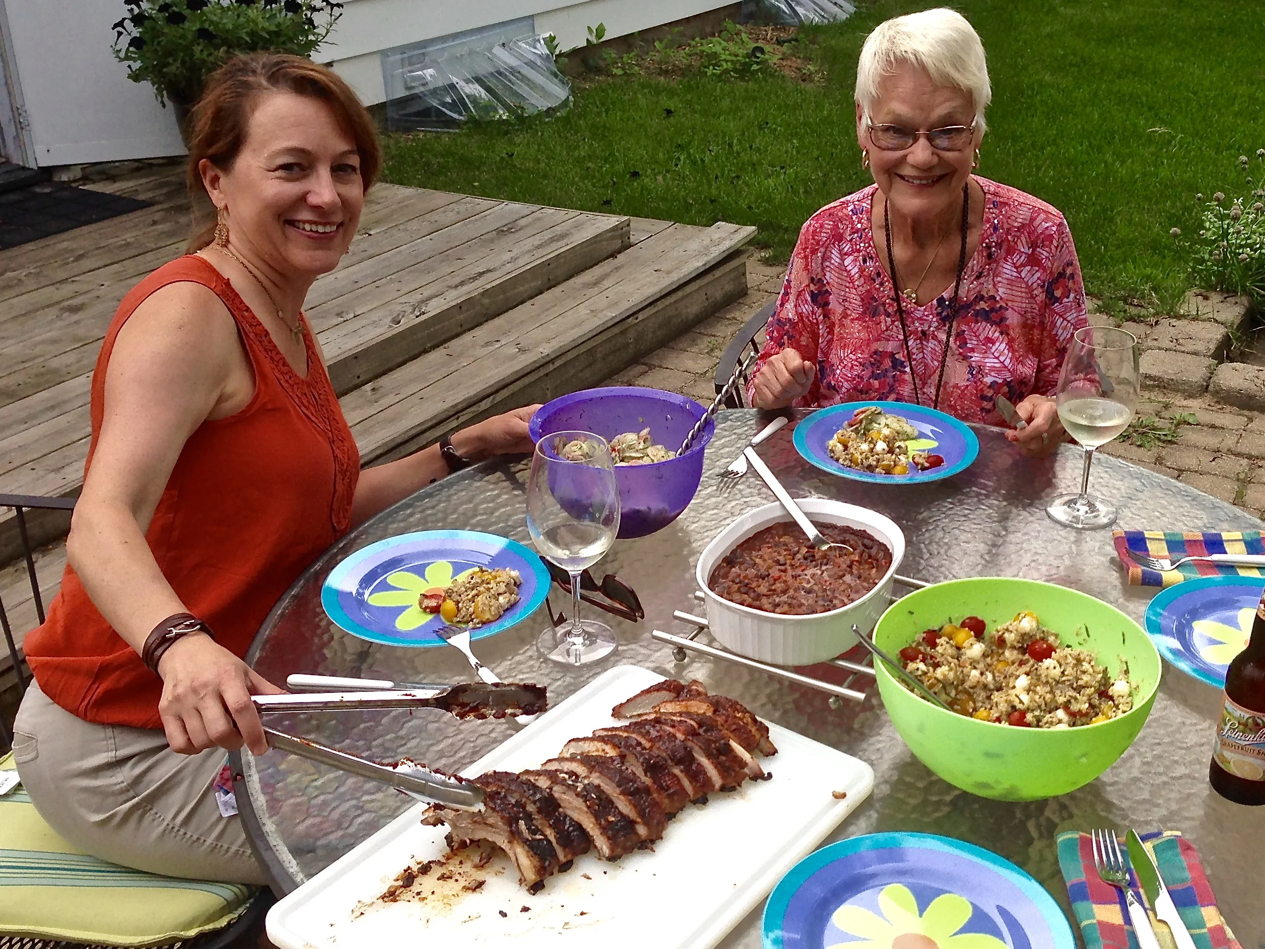 Backyard BBQ in Madison, WI: ribs, with baked beans and two salads. (That's my mom on the right)