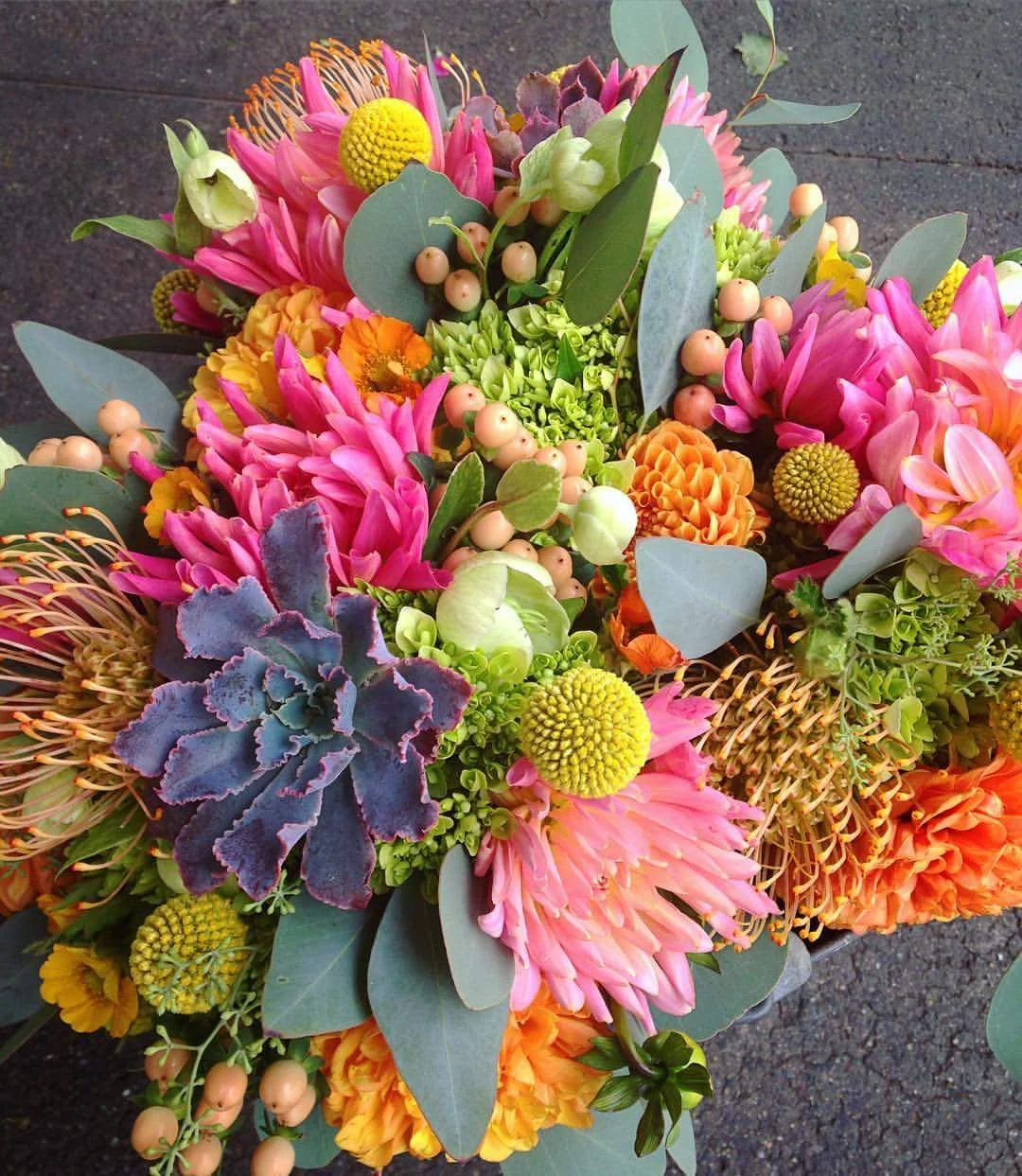  Summertime bouquets made to match the table setting. Created for a client at The Bud Stop.&nbsp; 