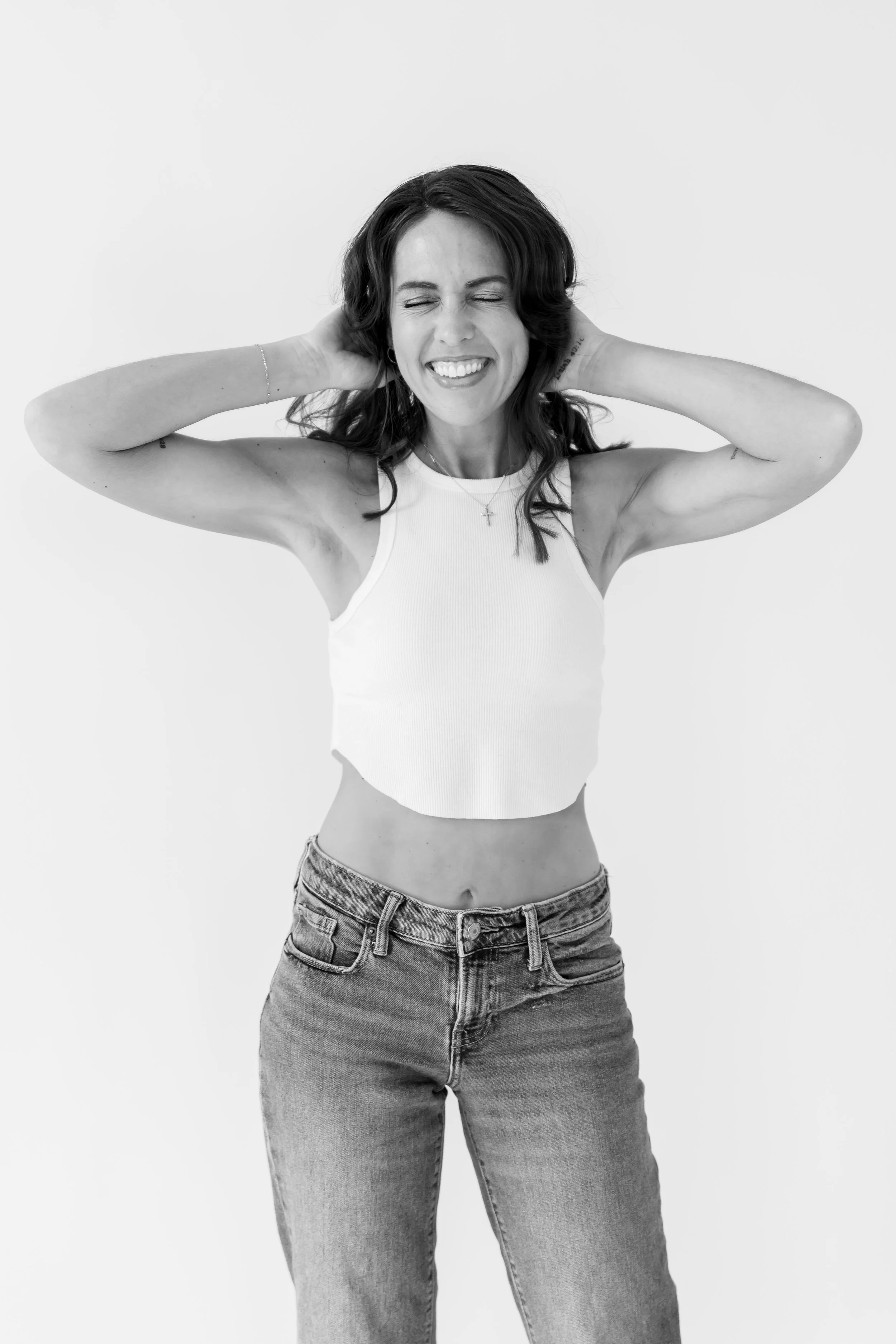 Woman smiling during a self-love portrat session at a photography studio in Knoxville, Tennessee