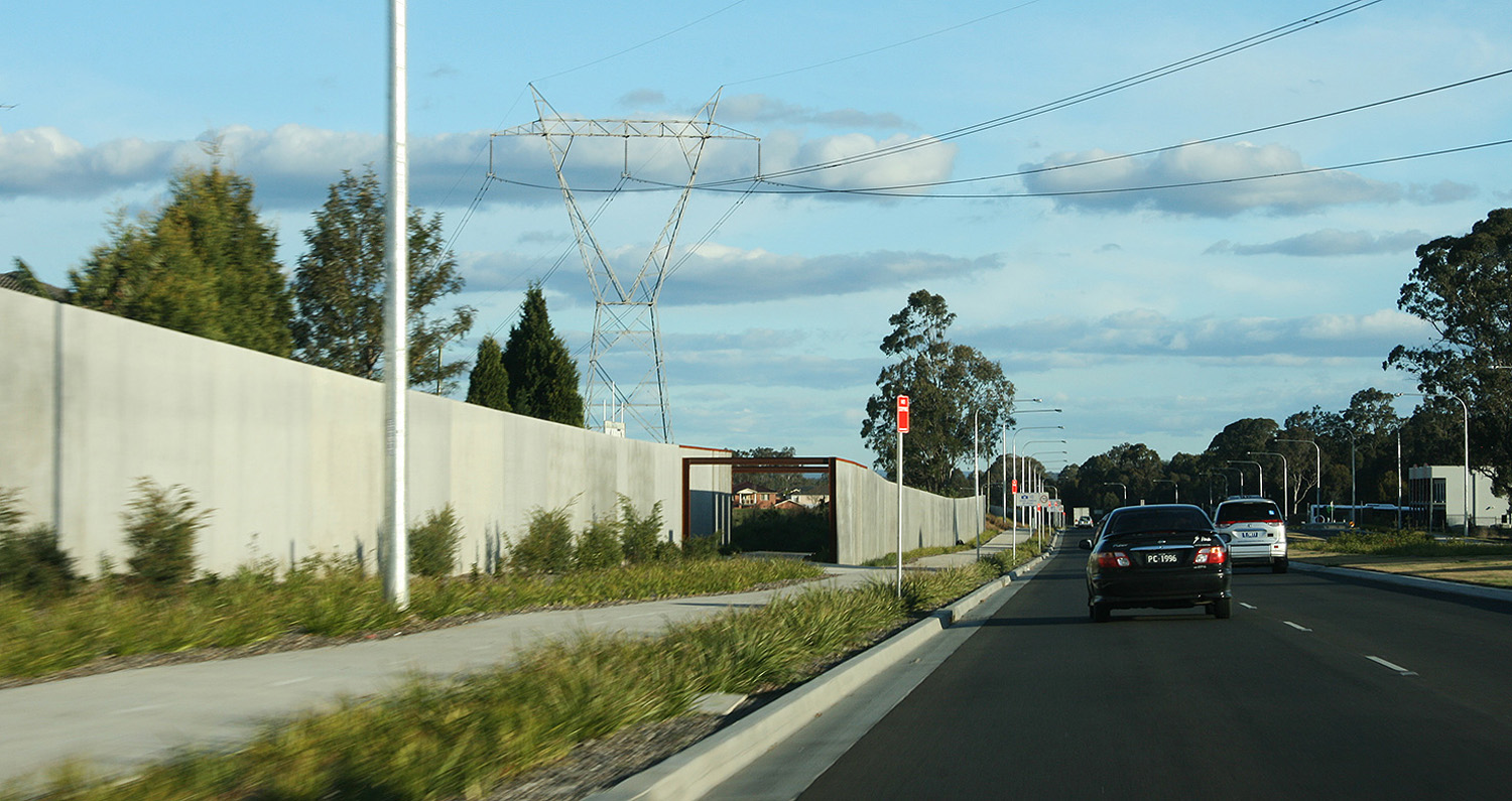 pedestrian access through sound wall.jpg