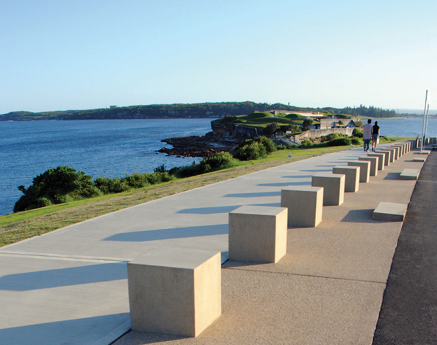 1-view south along coastal walk with bollards and dividing strips.jpg
