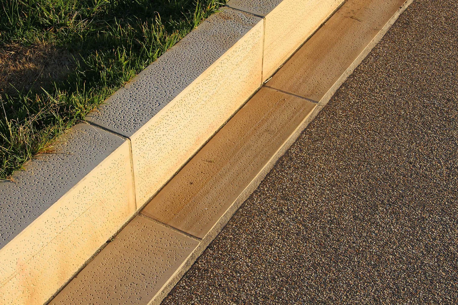 12-sandstone block kerb and gutter with exposed aggregate concrete.jpg