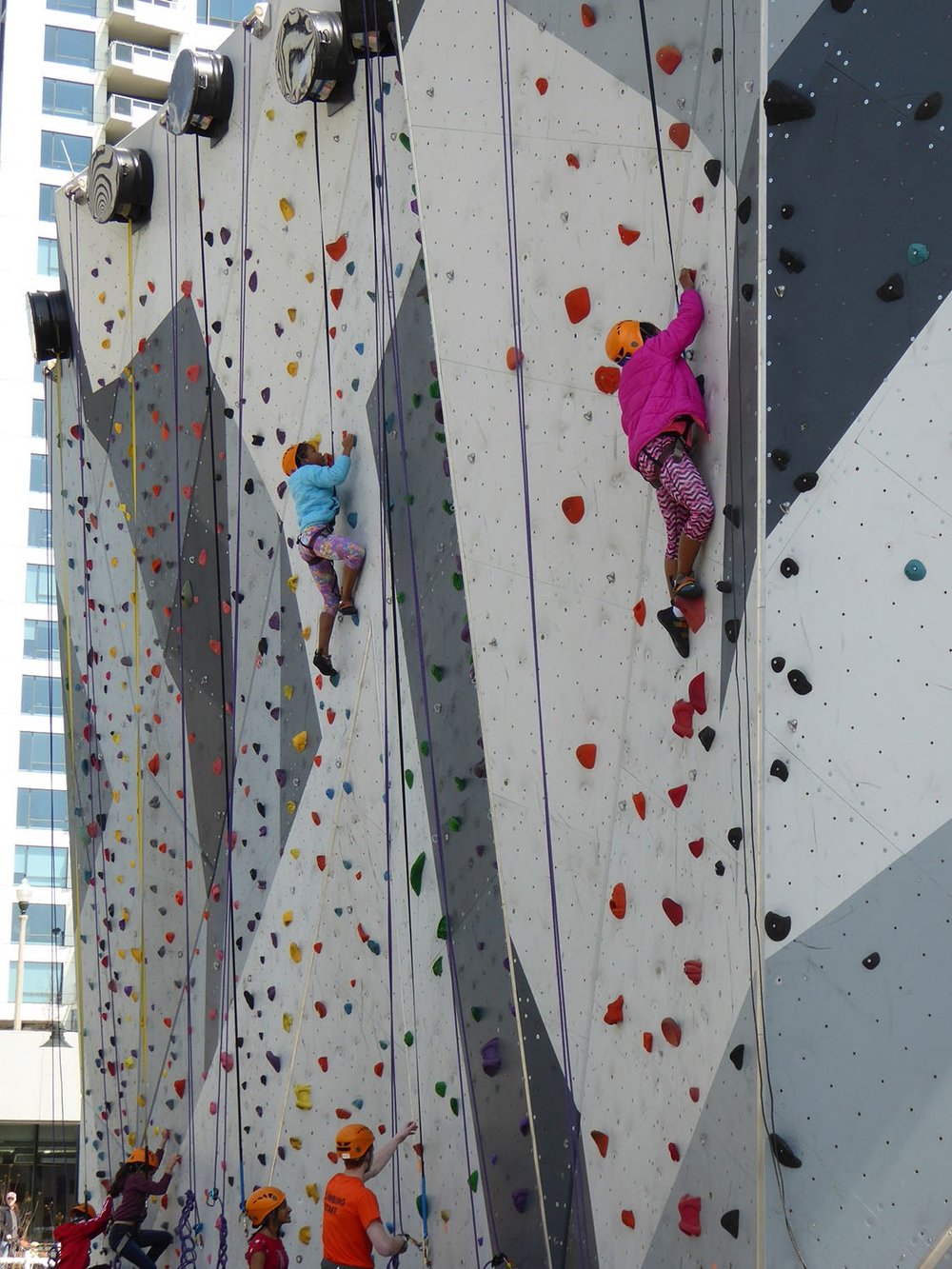 Children on rock climbing structure 