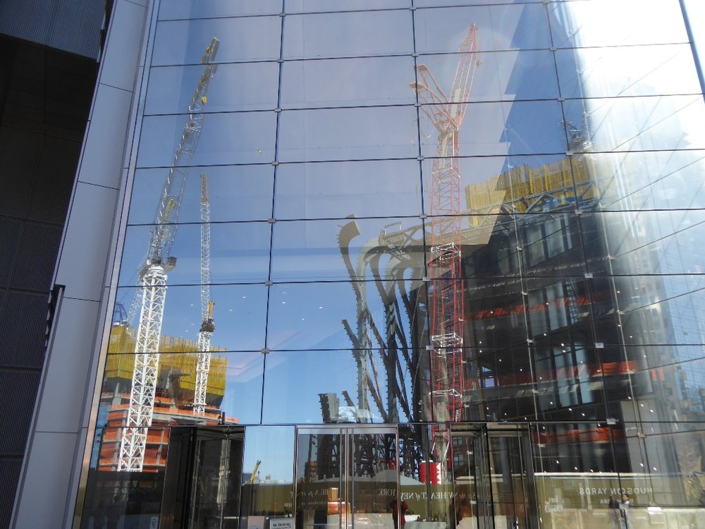 Reflection of The Culture Shed construction in existing building