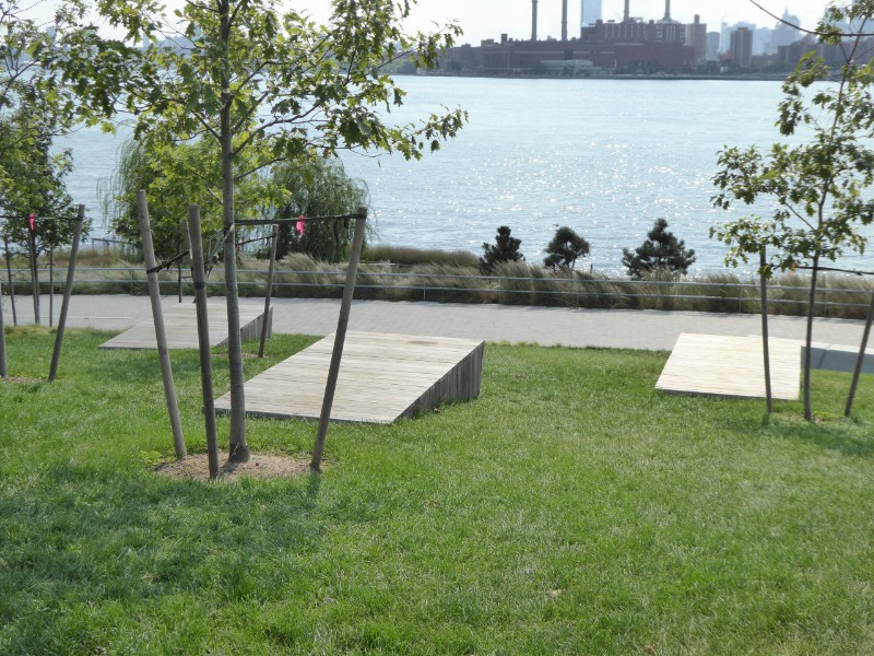 View from upper slope with timber sitting benches