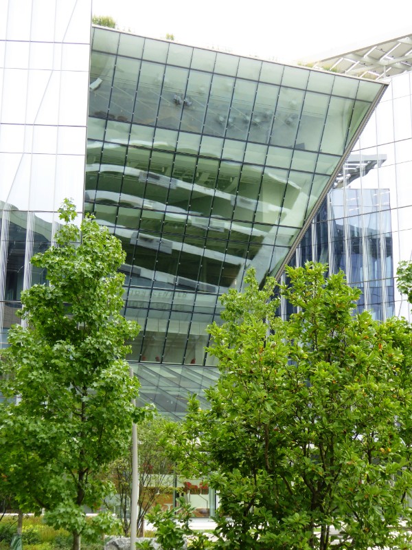 Tata Innovation Center with plaza reflected in upper fascade