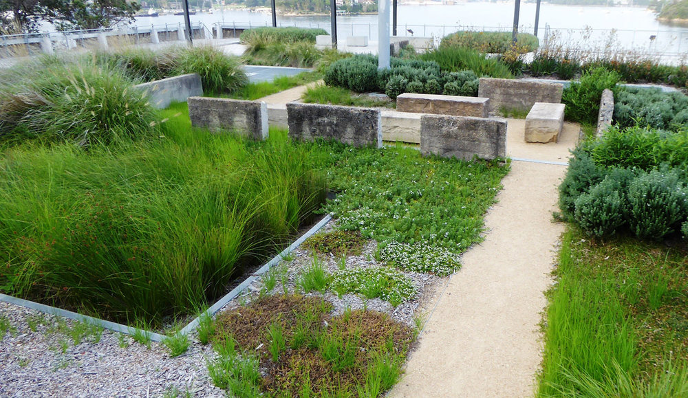 20. Garden with recycled material at south end of platform.JPG