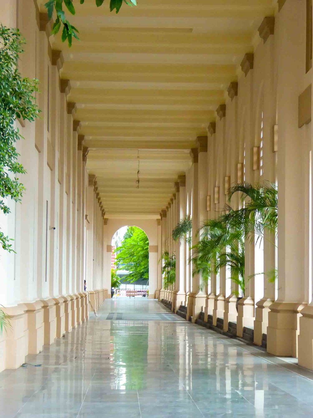 Colonade of new hotel in restored Colonial building