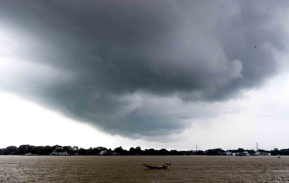  Dark cloud over fishing boat