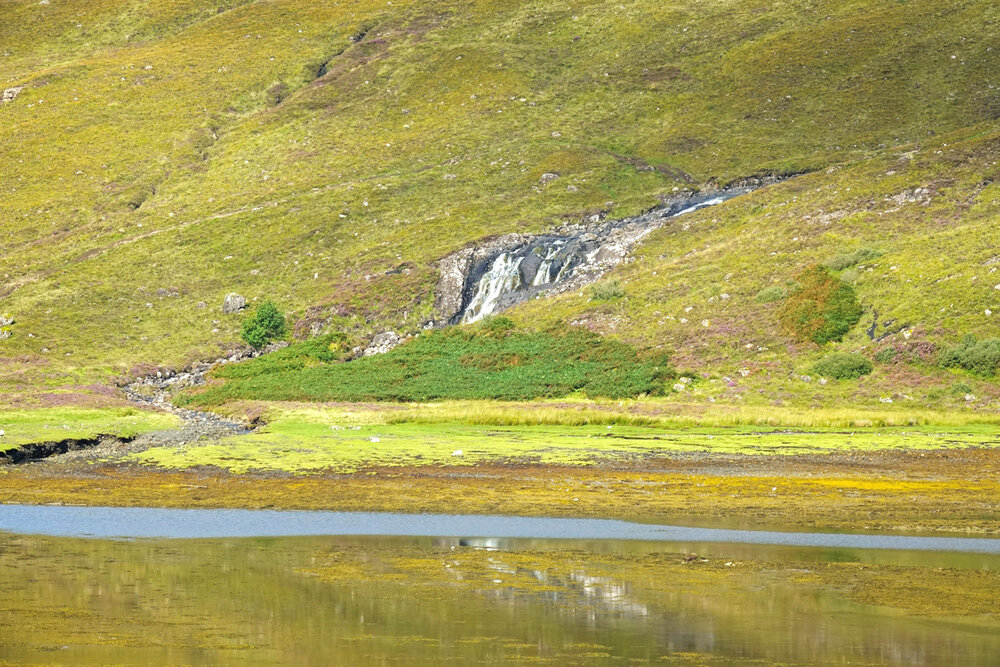 Waterfall at base of mountain