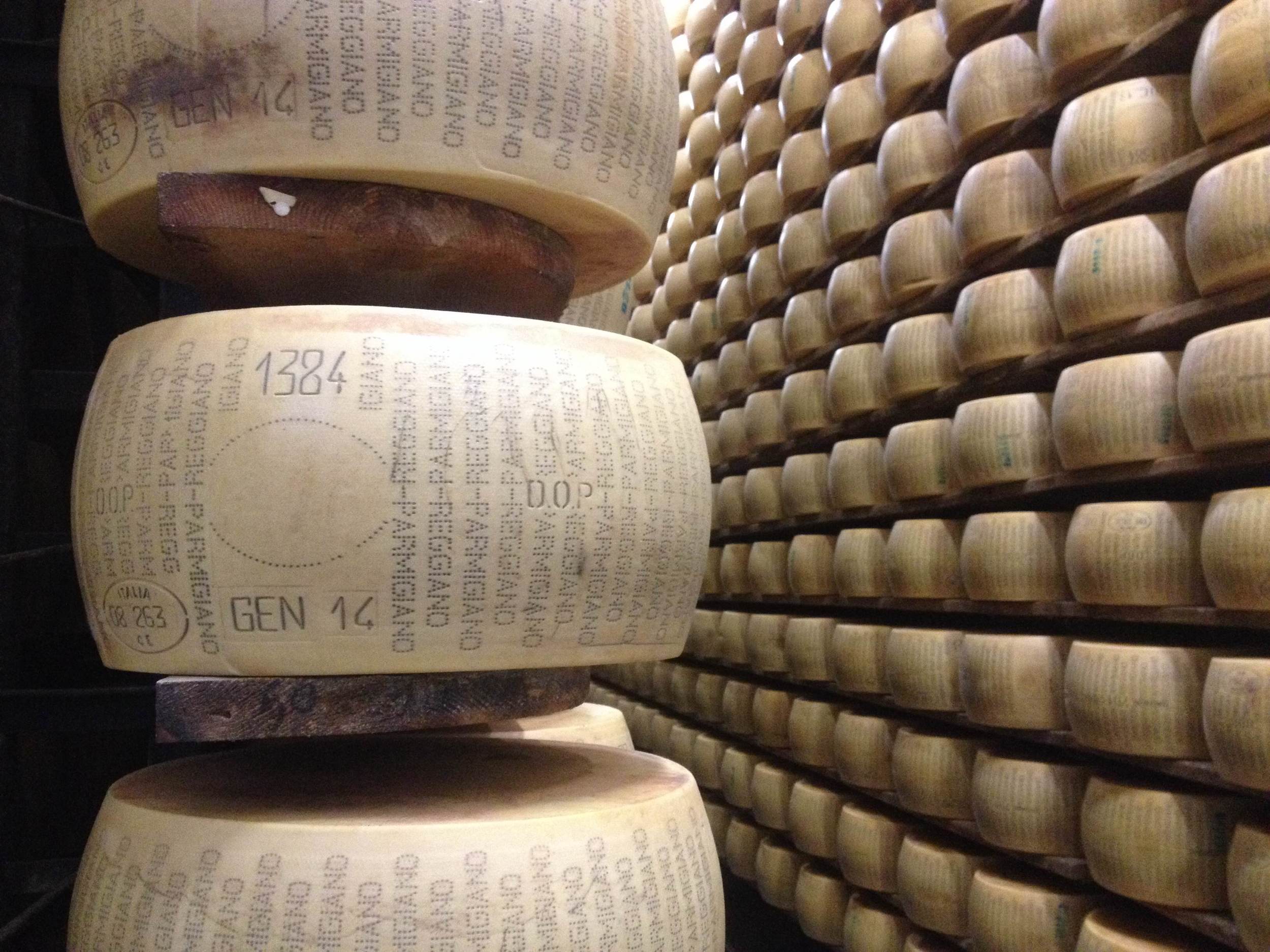 Unapproved_Parmigiano-Reggiano_wheel_on_shelf.JPG