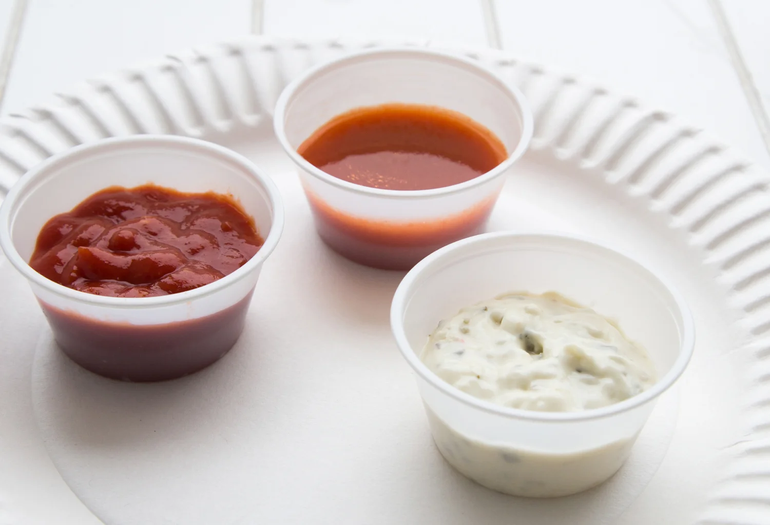 The sauces: cocktail, hot sauce and tartar sauce.
