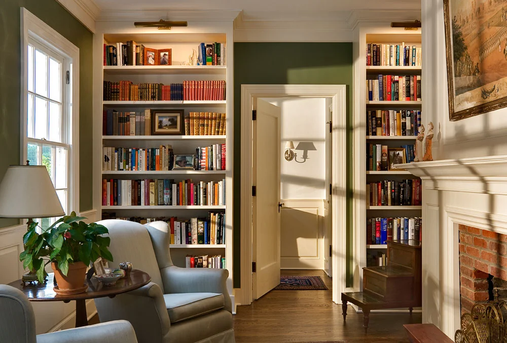 Sitting Room - Bookcases filled with interesting photos as well as good reads, give a room depth and interest. If there is room for a small fireplace, the small room is complete. Small rooms really don’t feel small at all if you can view the world beyond from a comfortable chair.