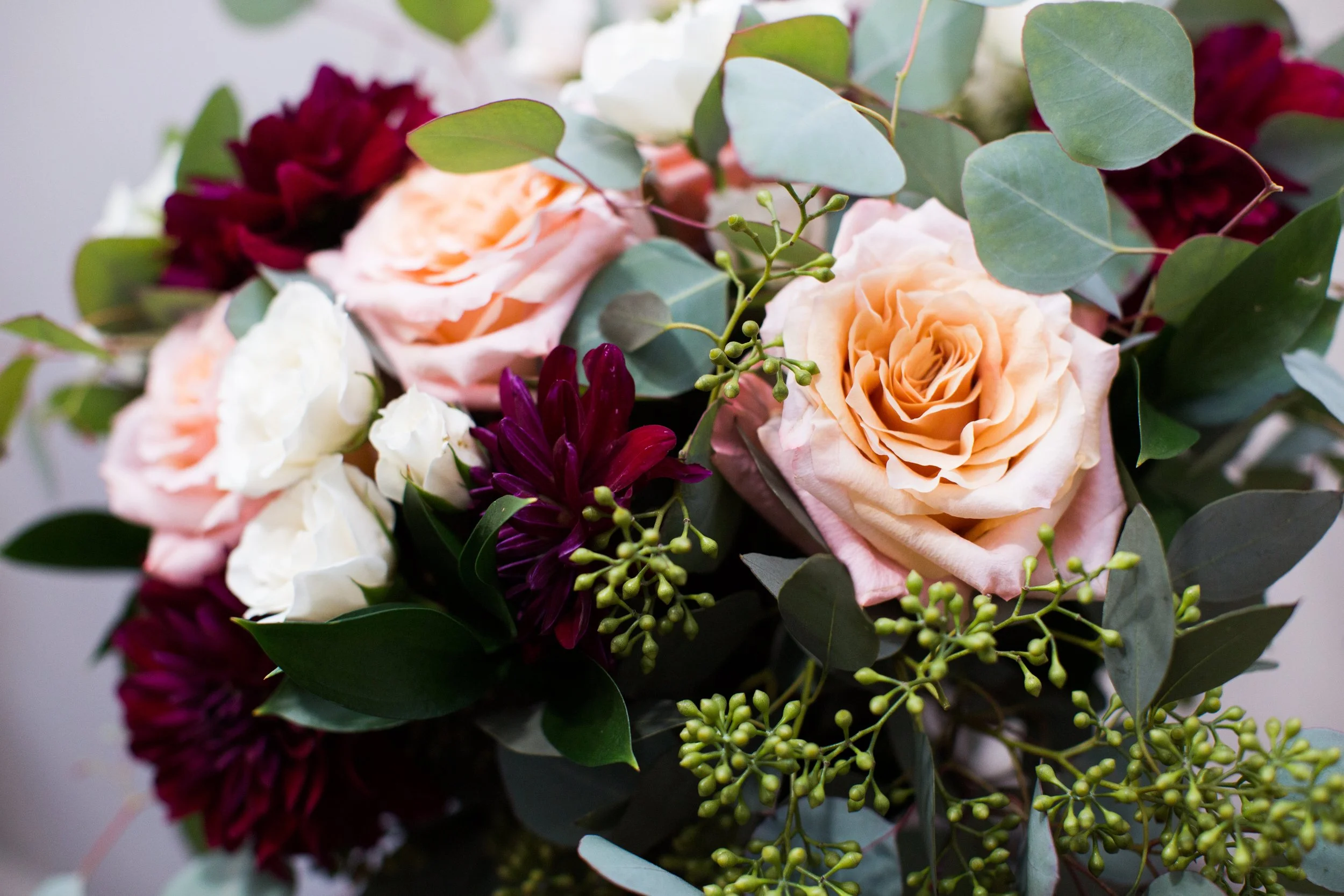Close up pink roses wedding bouquet