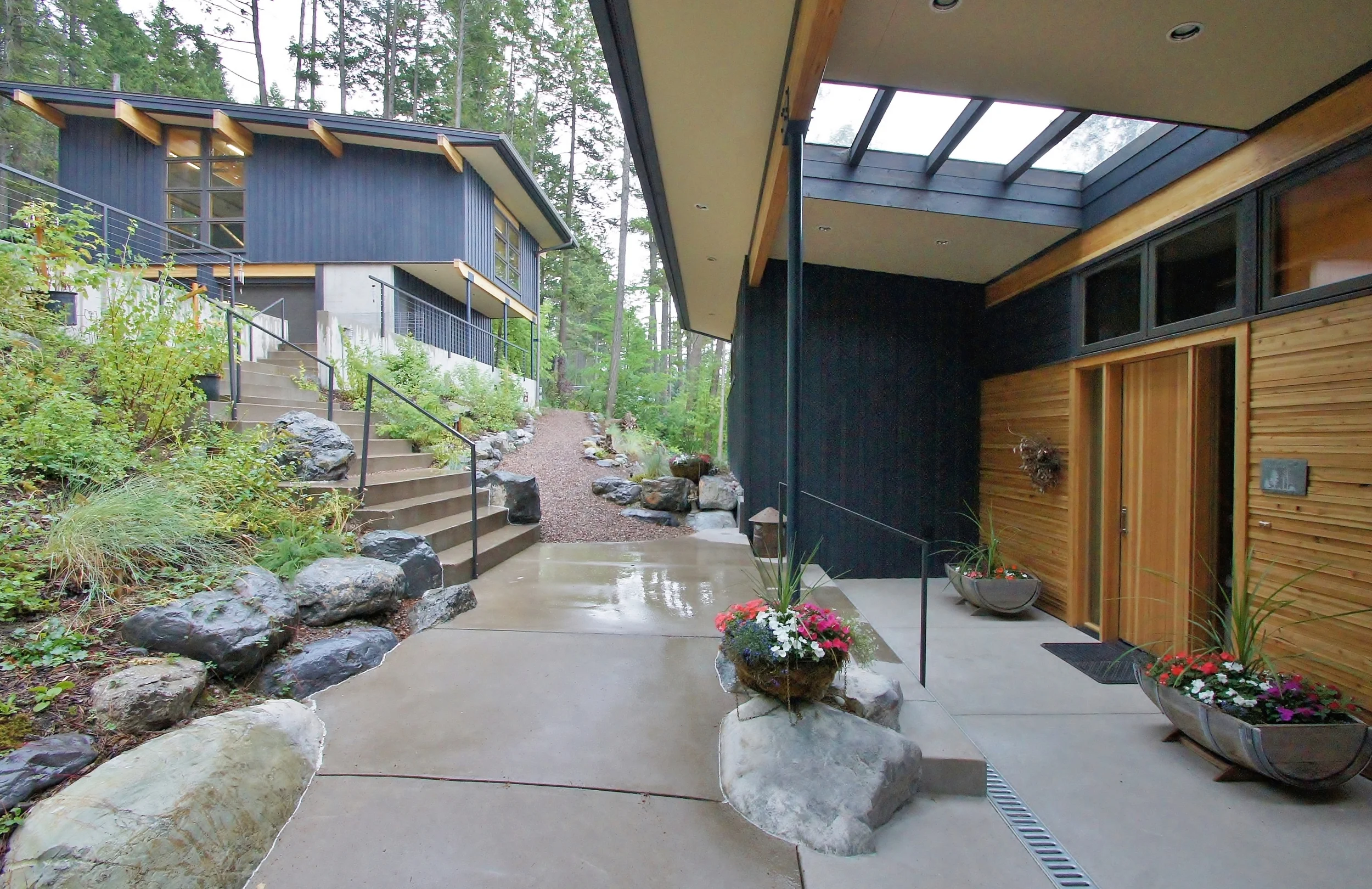 Taller walls allow for more light to enter the building on the uphill side